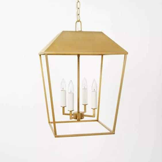 A brass lantern pendant against a white background, from Studio McGee for Target